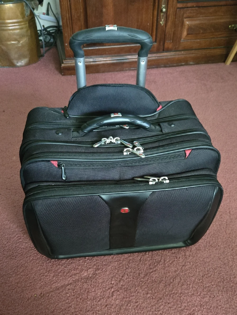SwissGear Black Rolling Laptop Bag with Red Accents